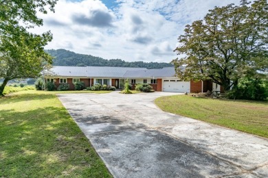 Full of character and comfort, this 1950's ranch-style home