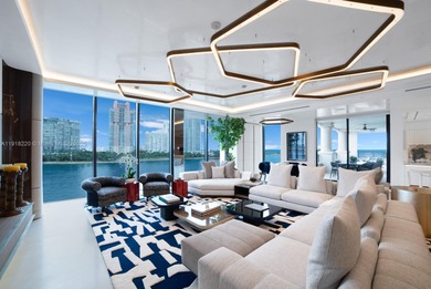 This elegantly designed 4-bedroom, 4.5-bath residence at Palazzo