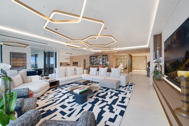 This elegantly designed 4-bedroom, 4.5-bath residence at Palazzo