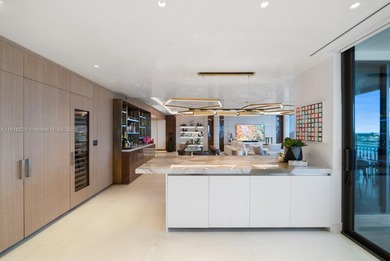 This elegantly designed 4-bedroom, 4.5-bath residence at Palazzo