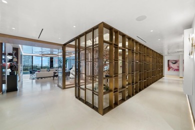 This elegantly designed 4-bedroom, 4.5-bath residence at Palazzo