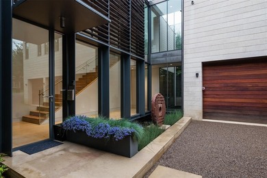 Introducing a stunning contemporary home in Park Cities. This