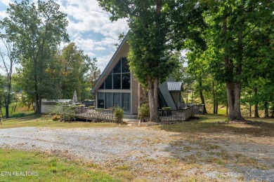 Charming WATERFRONT A-frame 3-bedroom, 2-bathroom, 1,536 sqft