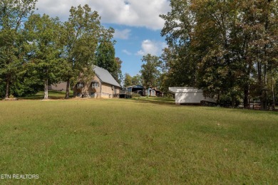 Charming WATERFRONT A-frame 3-bedroom, 2-bathroom, 1,536 sqft