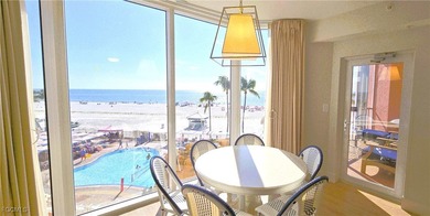 CAPTIVATING GULF VIEWS in upscale Resort beachfront condo with a