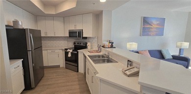 CAPTIVATING GULF VIEWS in upscale Resort beachfront condo with a