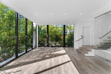 Beautifully designed and built in 2018, this modern townhouse