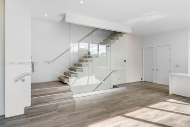 Beautifully designed and built in 2018, this modern townhouse