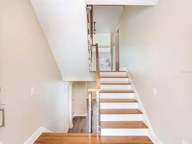 This corner, open-bay and downtown water view villa is truly a