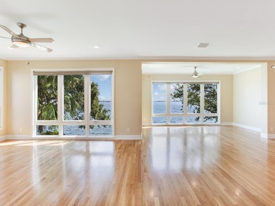 This corner, open-bay and downtown water view villa is truly a