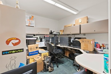 Space is currently configured as a large office with storage