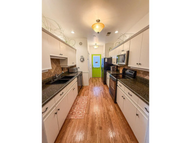 Welcome to 350 Woodlands Dr, Unit 1D - a stunning 3 bed, 2 bath