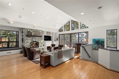 The main level welcomes you with soaring vaulted ceilings