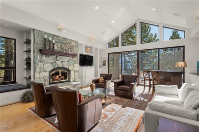 The main level welcomes you with soaring vaulted ceilings