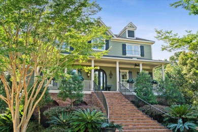 Nestled on a picturesque tree-lined street, this expansive home