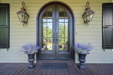 Nestled on a picturesque tree-lined street, this expansive home