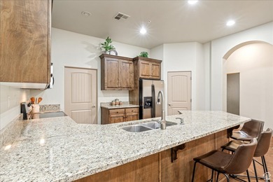 Enjoy resort-style living in this beautifully maintained 3