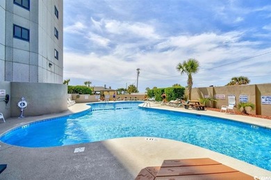 Experience coastal living at its finest in this beautifully