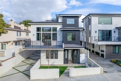 Nestled gracefully on one of the most sought-after streets in