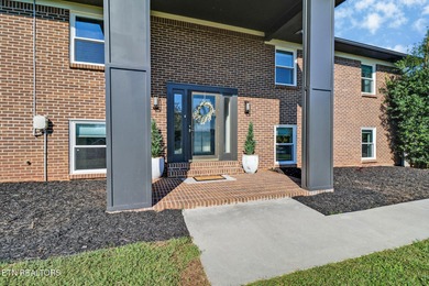 A luxurious modern design with water views of Watts Bar, an