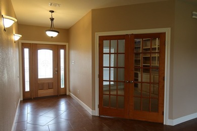 Beautiful Custom Home on the 14th green at the Flying L Ranch