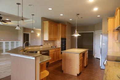 Beautiful Custom Home on the 14th green at the Flying L Ranch