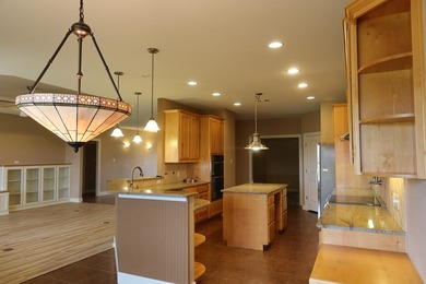 Beautiful Custom Home on the 14th green at the Flying L Ranch