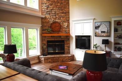 Welcome to this stunning river front home on 5 acres with