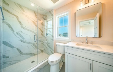 This single-family custom built home offers a level of island