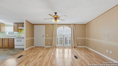 Enjoy Hill Country living in this lovely 3-bedroom, 2-bath home