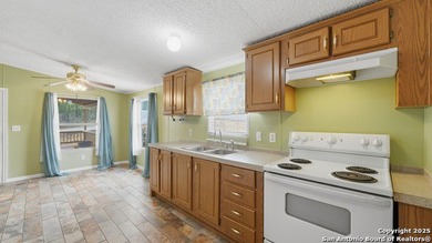 Enjoy Hill Country living in this lovely 3-bedroom, 2-bath home
