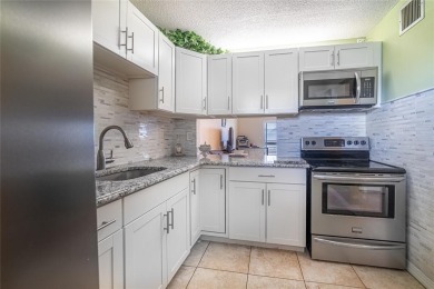 This spacious top-floor 2-bedroom, 2-bath corner condo with