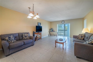 This spacious top-floor 2-bedroom, 2-bath corner condo with