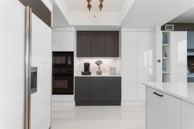 Unit 402 at The Diplomat Residences is truly in a class of its