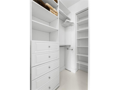 Unit 402 at The Diplomat Residences is truly in a class of its