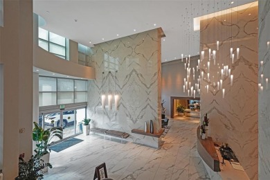 Unit 402 at The Diplomat Residences is truly in a class of its