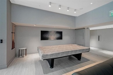 Unit 402 at The Diplomat Residences is truly in a class of its