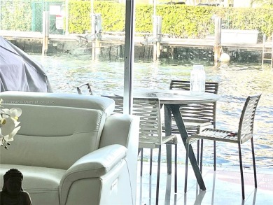 Discover waterfront living in this beautifully remodeled