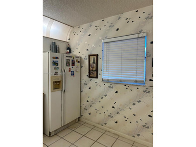 Beautiful corner unit located in a gated community offering