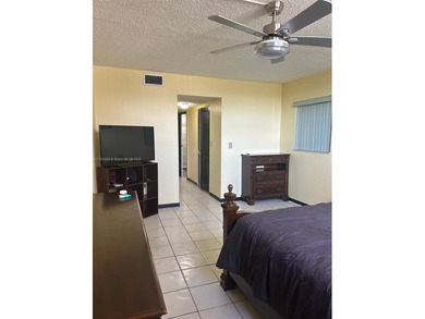 Beautiful corner unit located in a gated community offering