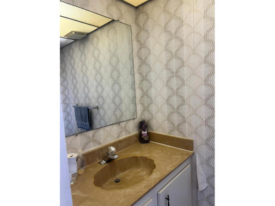 Beautiful corner unit located in a gated community offering