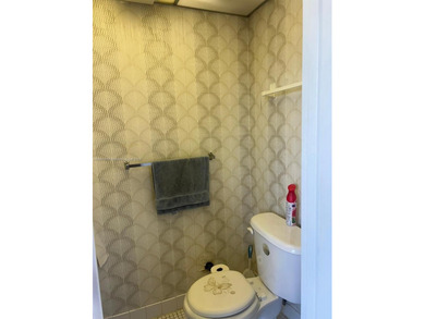 Beautiful corner unit located in a gated community offering