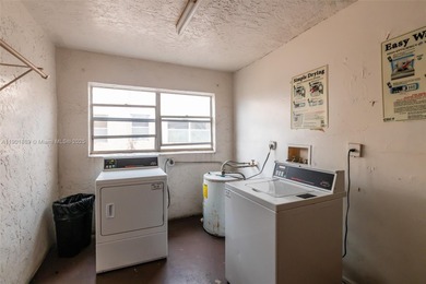 Beautiful corner unit located in a gated community offering