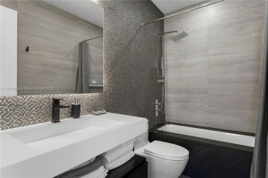 A meticulously designed, custom two-story penthouse in the sky