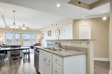 CORNER UNIT WITH EXTRA WINDOWS + WATERWAY VIEWS! This 1-bedroom