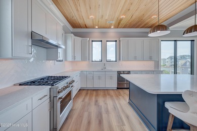 Discover unparalleled coastal living in this stunning newly