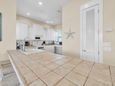 Located in the serene Holiday Isle neighborhood of Destin Pointe