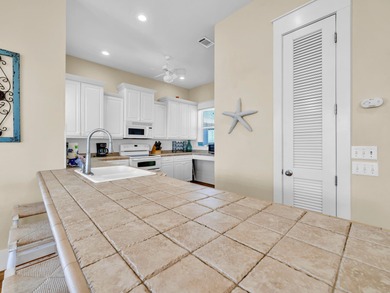 Located in the serene Holiday Isle neighborhood of Destin Pointe