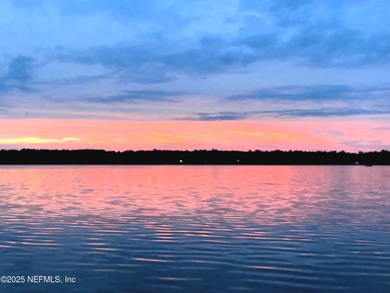 Water-lover's paradise! This lake home oasis is off the beaten