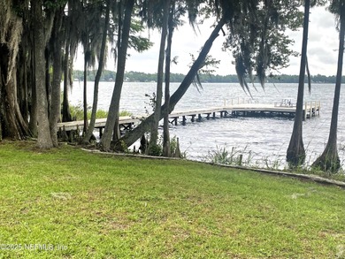 Water-lover's paradise! This lake home oasis is off the beaten